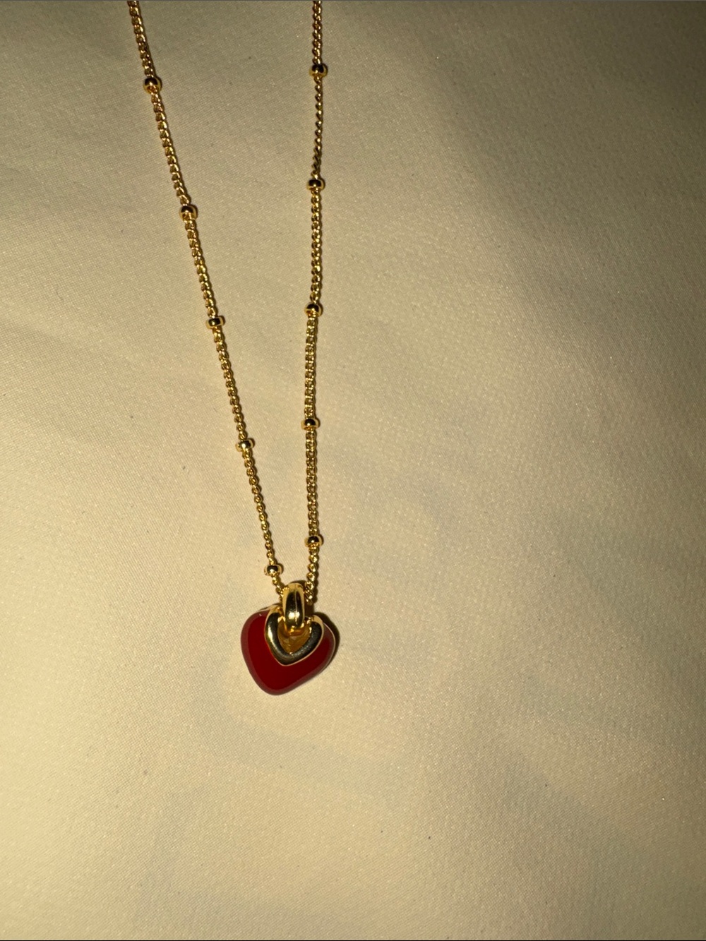 Gold-Tone Necklace with Red Heart Pendant